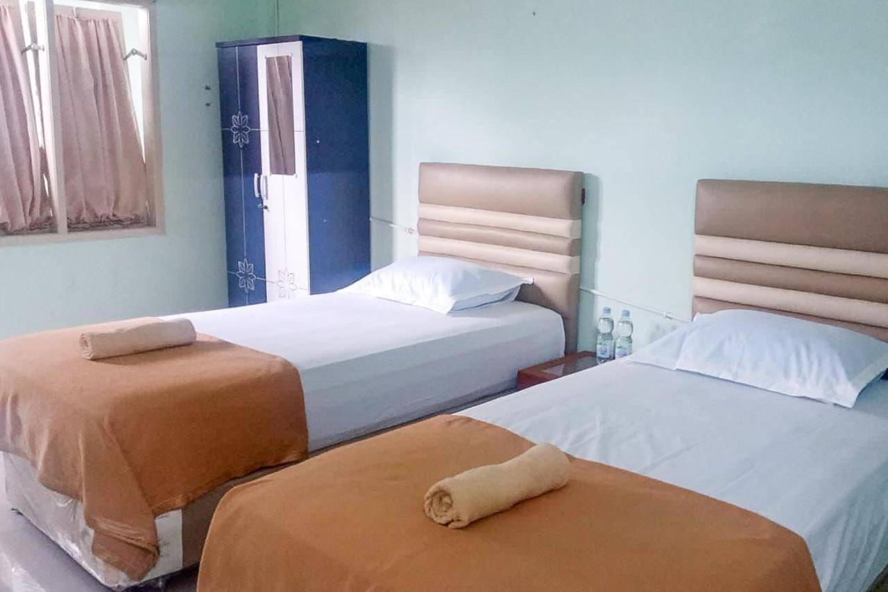 Sutomo Indah Homestay Syariah Mitra Reddoorz Padang Sidempuan ภายนอก รูปภาพ