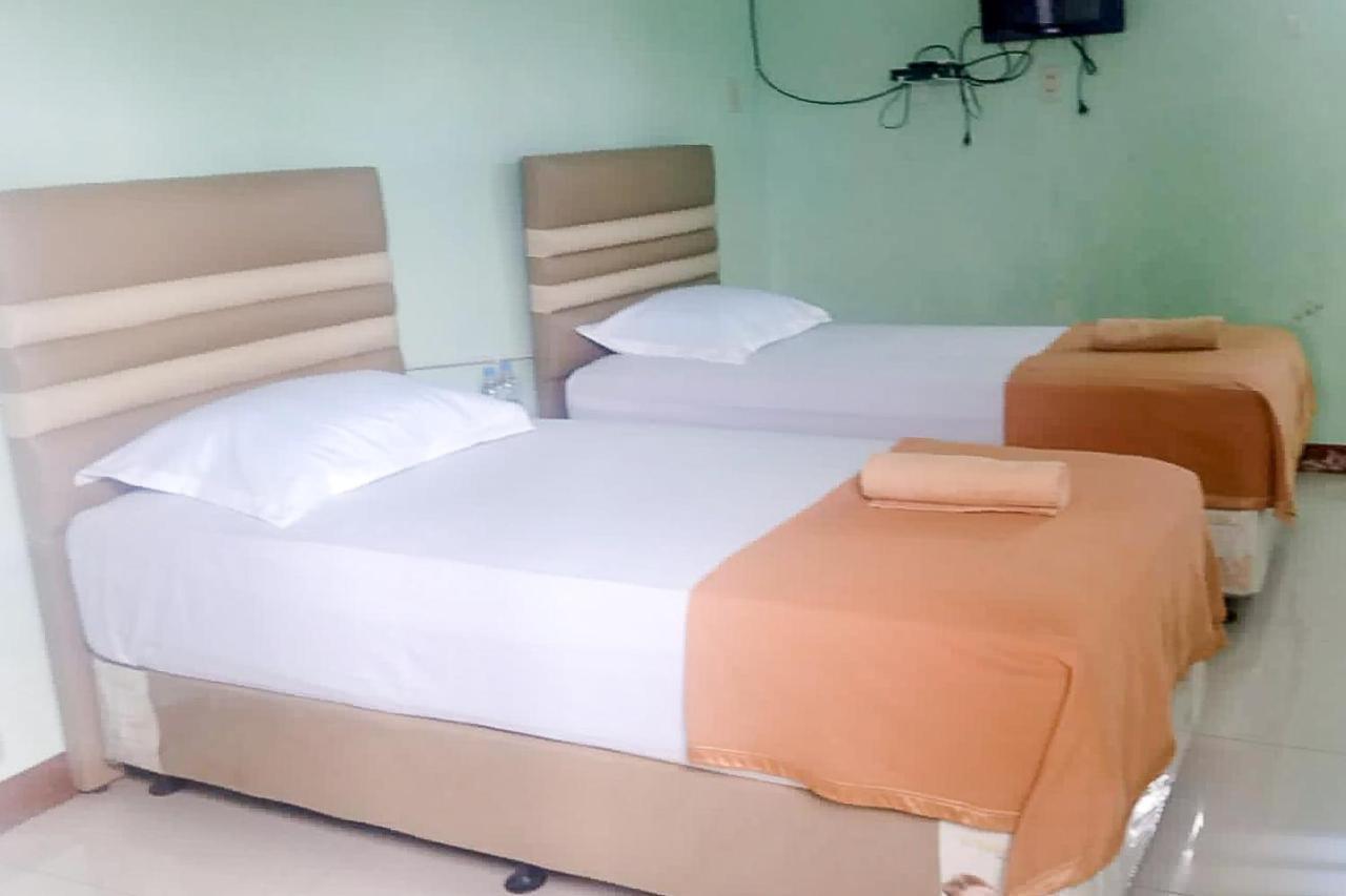 Sutomo Indah Homestay Syariah Mitra Reddoorz Padang Sidempuan ภายนอก รูปภาพ